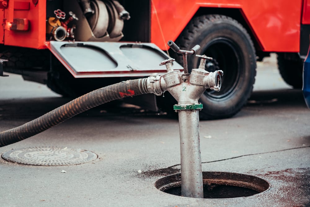 Fire hydrants lined up, showcasing the importance of fire pumps in comparison to jockey pumps in fire protection systems.