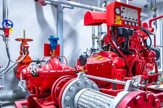 Industrial fire pump system with red machinery and control panel